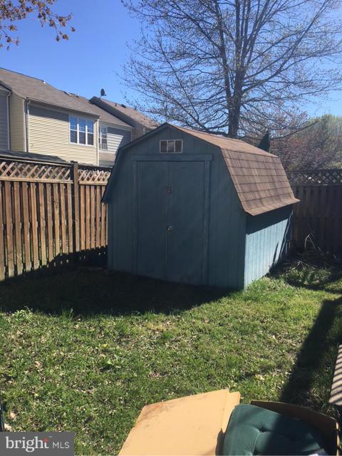 4401 Cole Farm Road Baltimore, MD 21236 - Photo 20 of 21 a view of a house with a yard