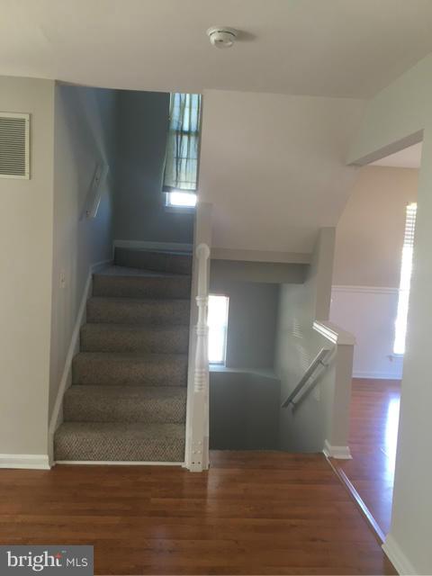 4401 Cole Farm Road Baltimore, MD 21236 - Photo 6 of 21 a view of entryway and hall with wooden floor