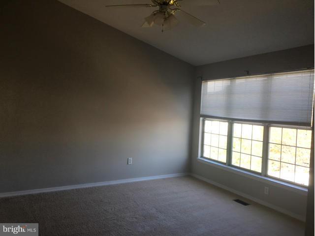 4401 Cole Farm Road Baltimore, MD 21236 - Photo 10 of 21 an empty room with a window