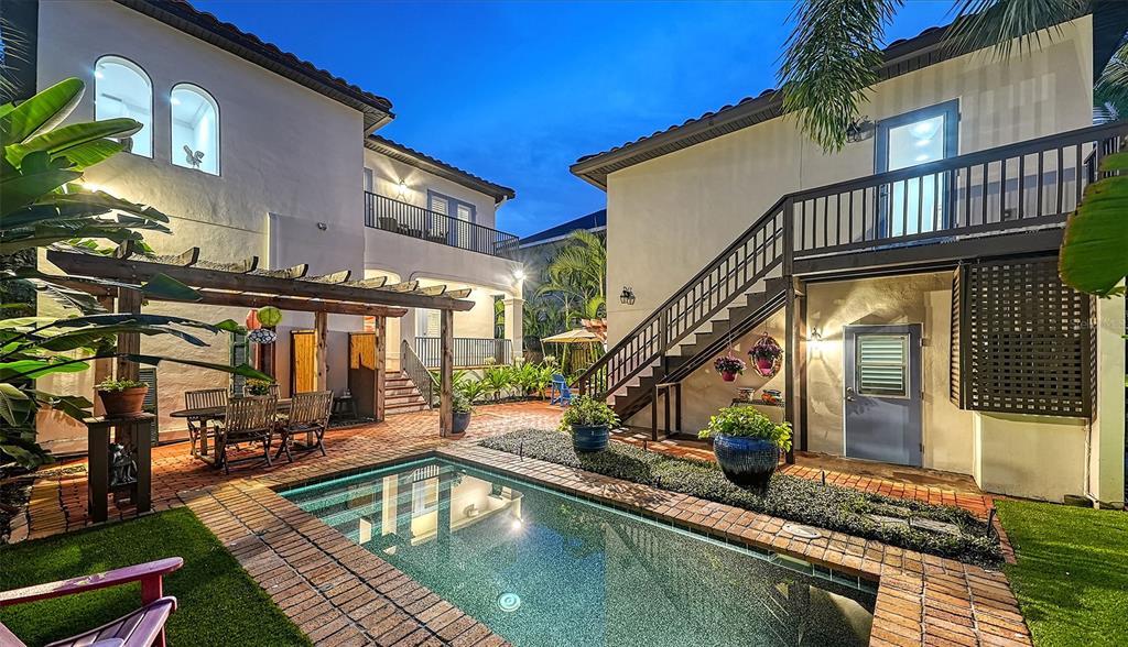1723 Oak Street Sarasota, FL 34236 - Photo 1 of 1 Beautiful night views enhanced with outdoor lighting.