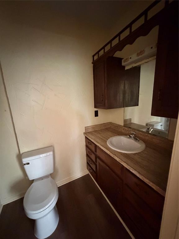257 West Acres Road Gun Barrel City, TX 75156 - Photo 15 of 22 a bathroom with a sink and a toilet