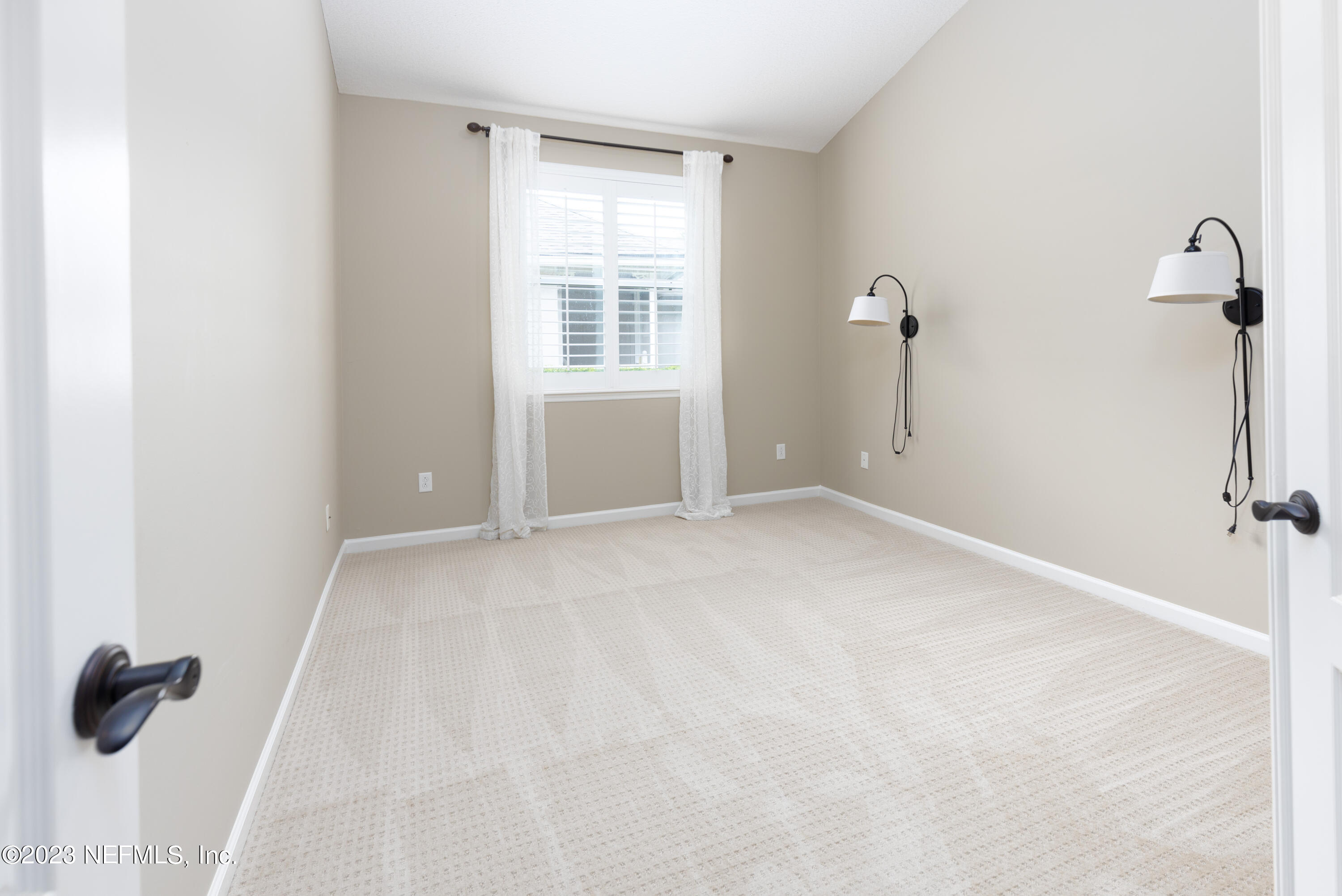 1516 Valhalla Way St. Augustine, FL 32092 - Photo 12 of 46 a view of an empty room with a window