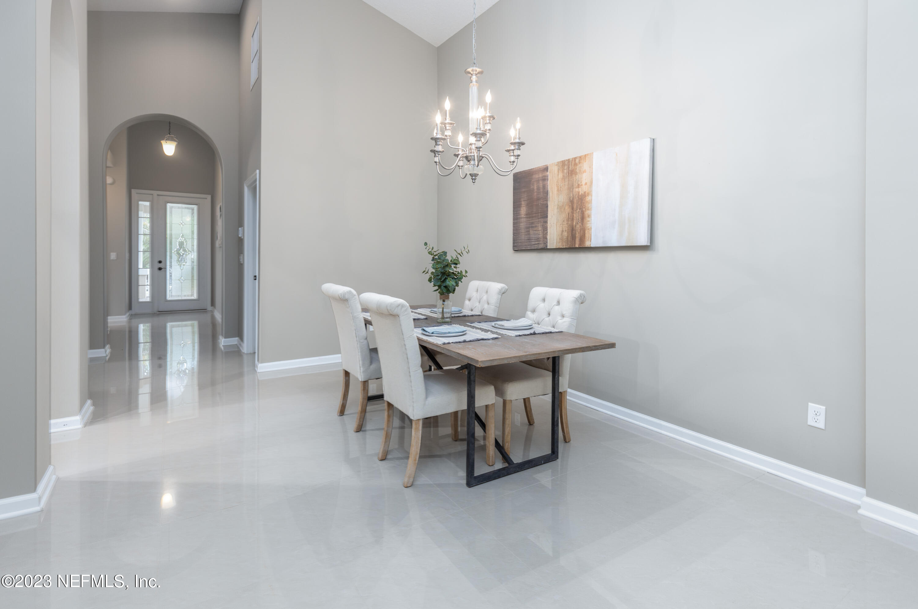 1516 Valhalla Way St. Augustine, FL 32092 - Photo 13 of 46 a dining room with furniture and chandelier