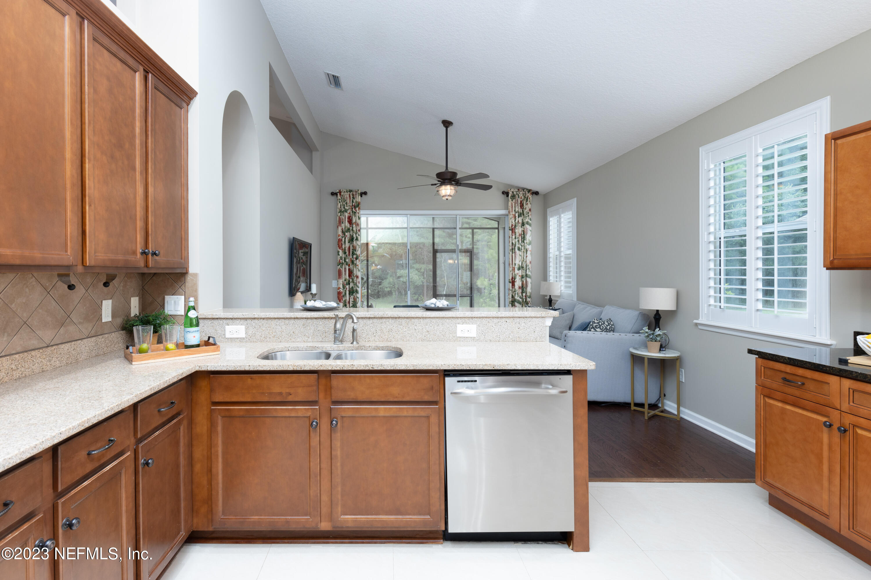 1516 Valhalla Way St. Augustine, FL 32092 - Photo 16 of 46 a kitchen with a sink and cabinets