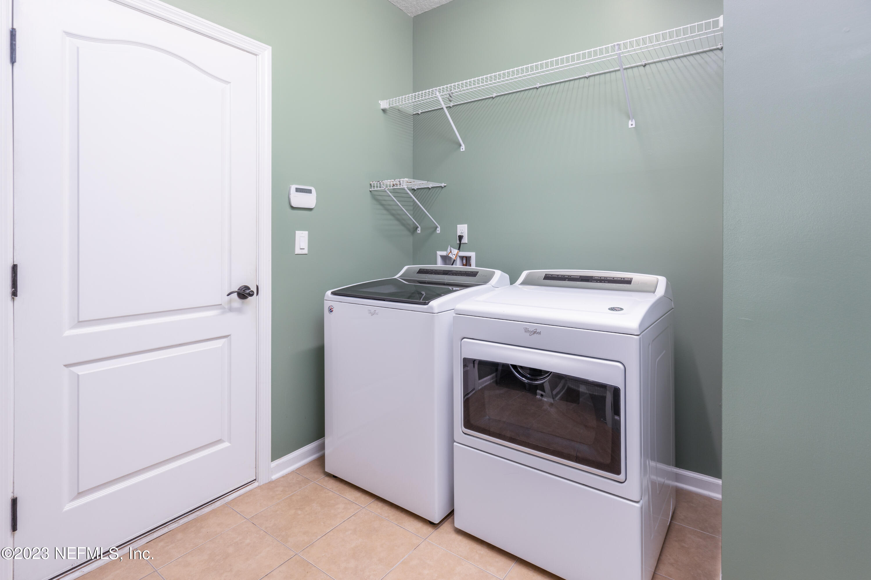 1516 Valhalla Way St. Augustine, FL 32092 - Photo 19 of 46 a utility room with dryer and washer