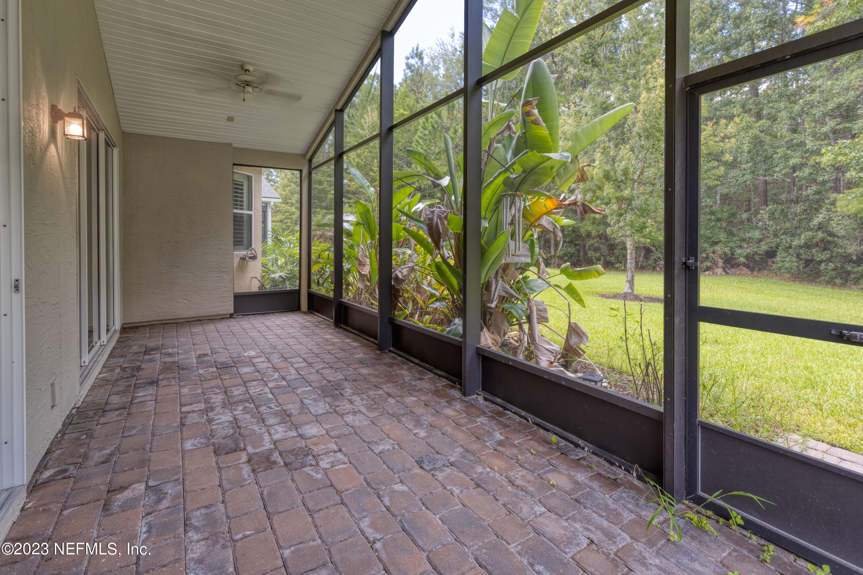 1516 Valhalla Way St. Augustine, FL 32092 - Photo 24 of 46 wooden floor in an empty room with a large window
