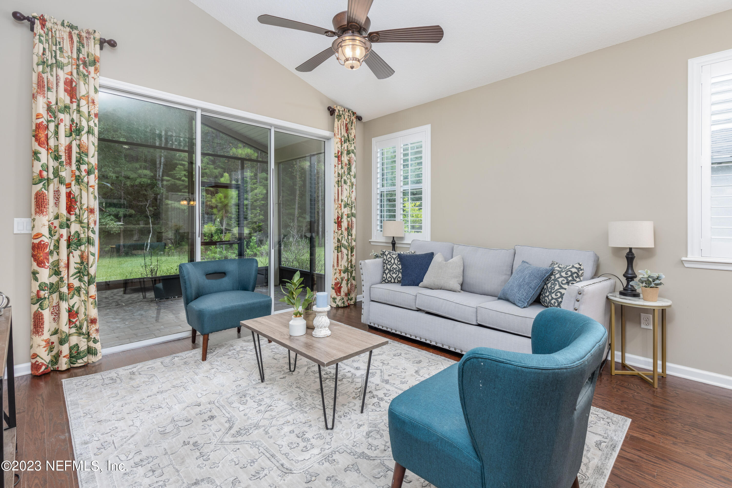 1516 Valhalla Way St. Augustine, FL 32092 - Photo 3 of 46 a living room with furniture and a large window