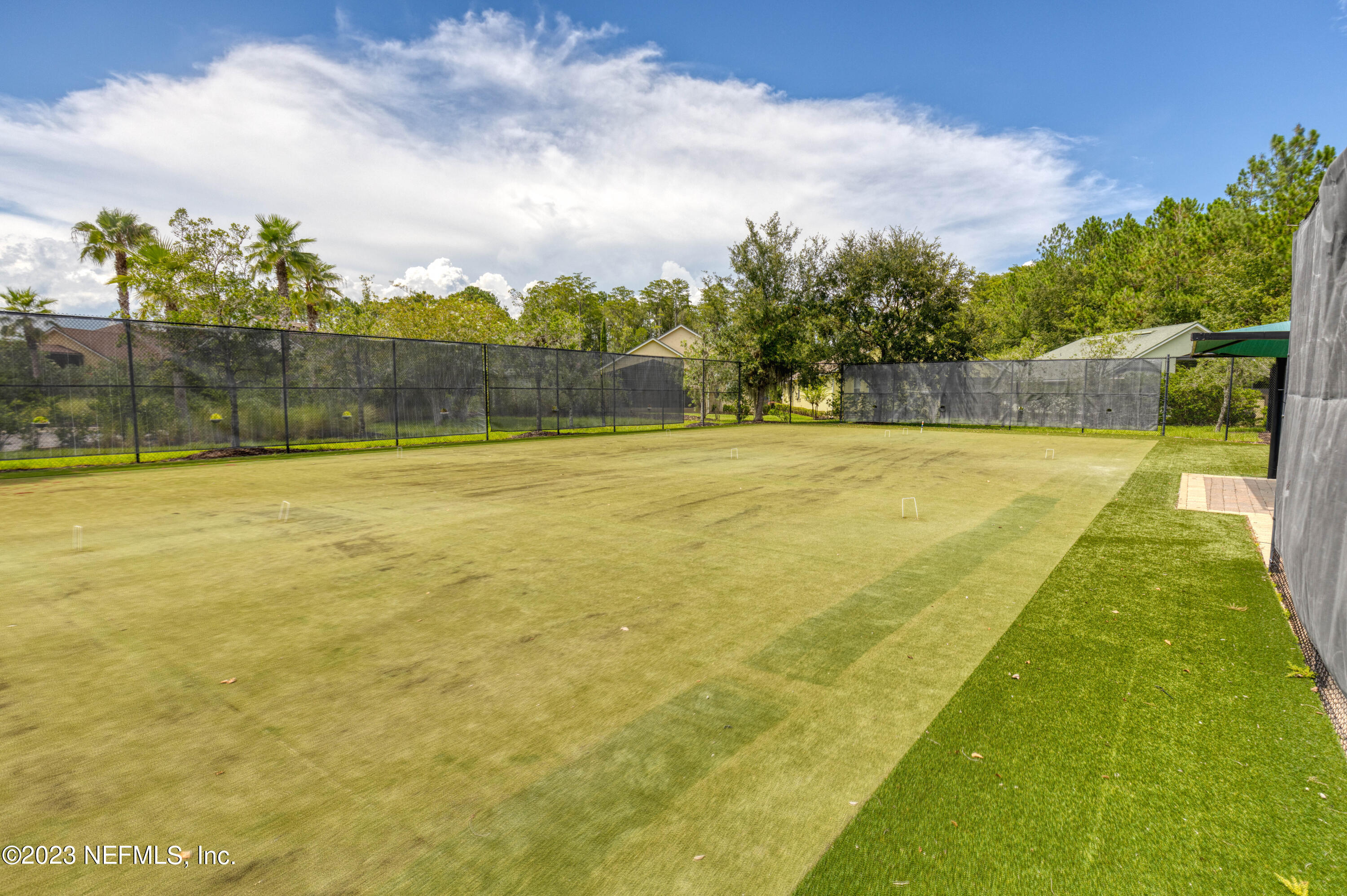 1516 Valhalla Way St. Augustine, FL 32092 - Photo 33 of 46 a view of a swimming pool with an outdoor seating and yard