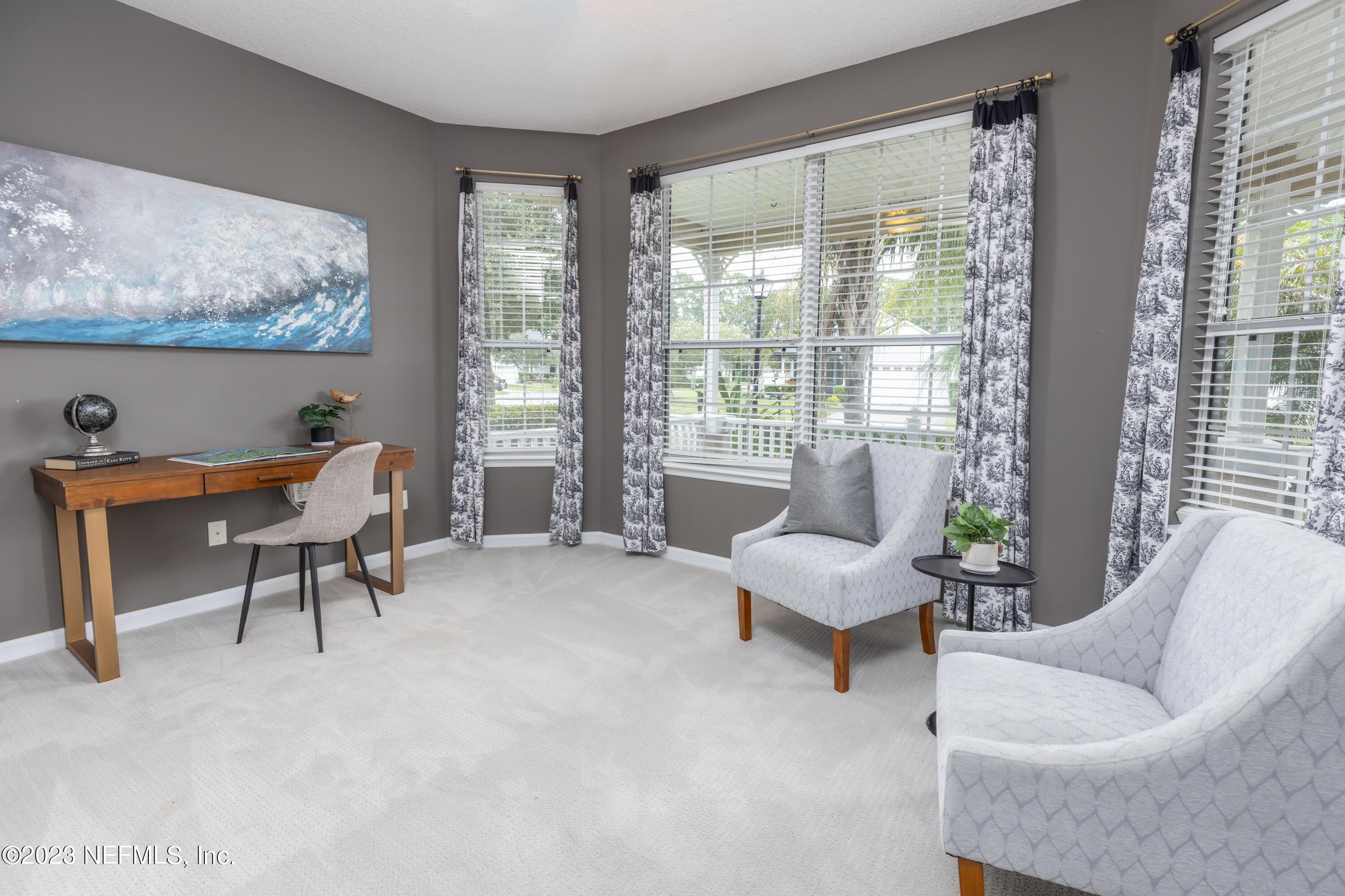 1516 Valhalla Way St. Augustine, FL 32092 - Photo 4 of 46 a living room with furniture and a large window