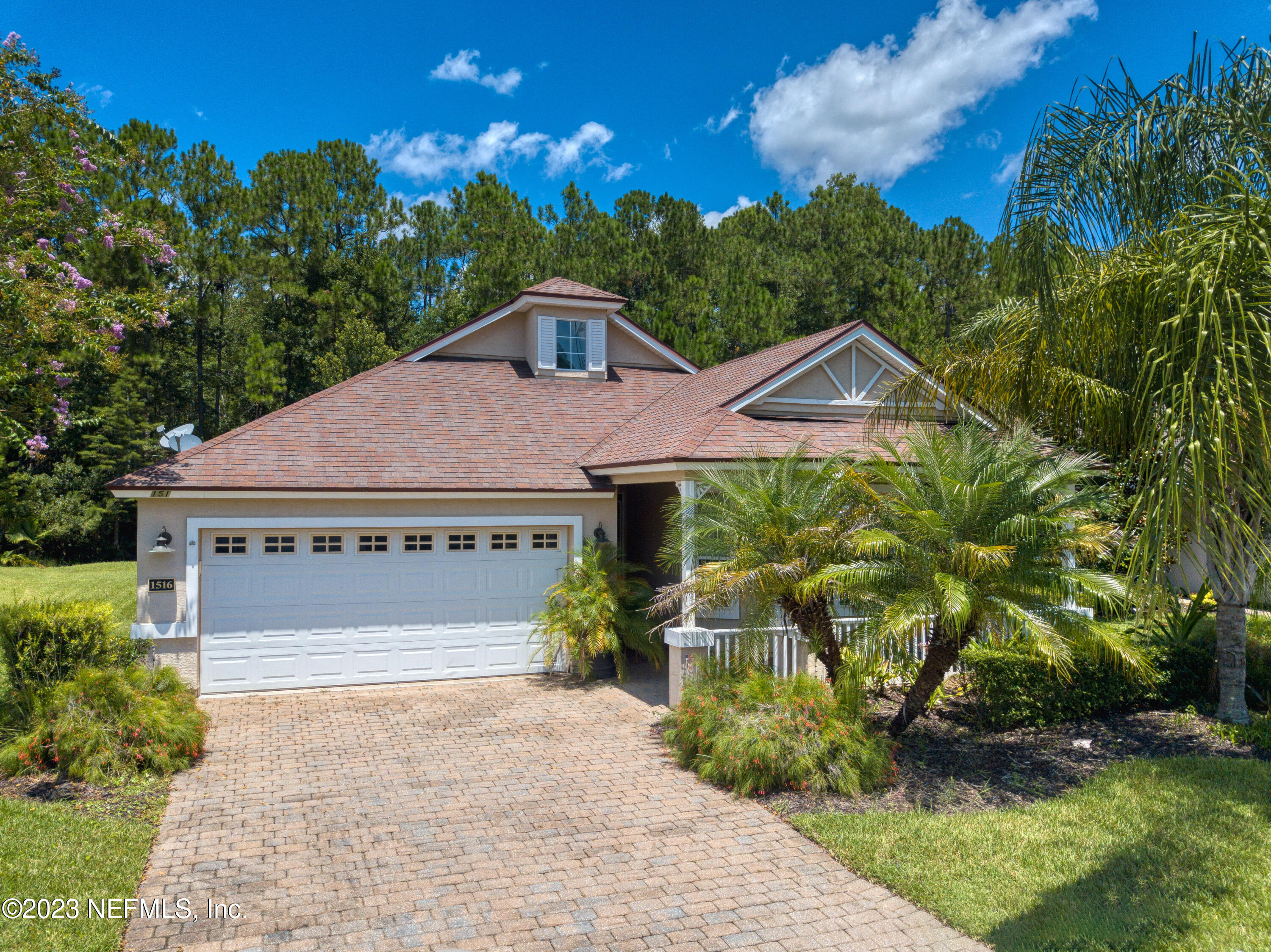 1516 Valhalla Way St. Augustine, FL 32092 - Photo 6 of 46 a front view of a house with a yard
