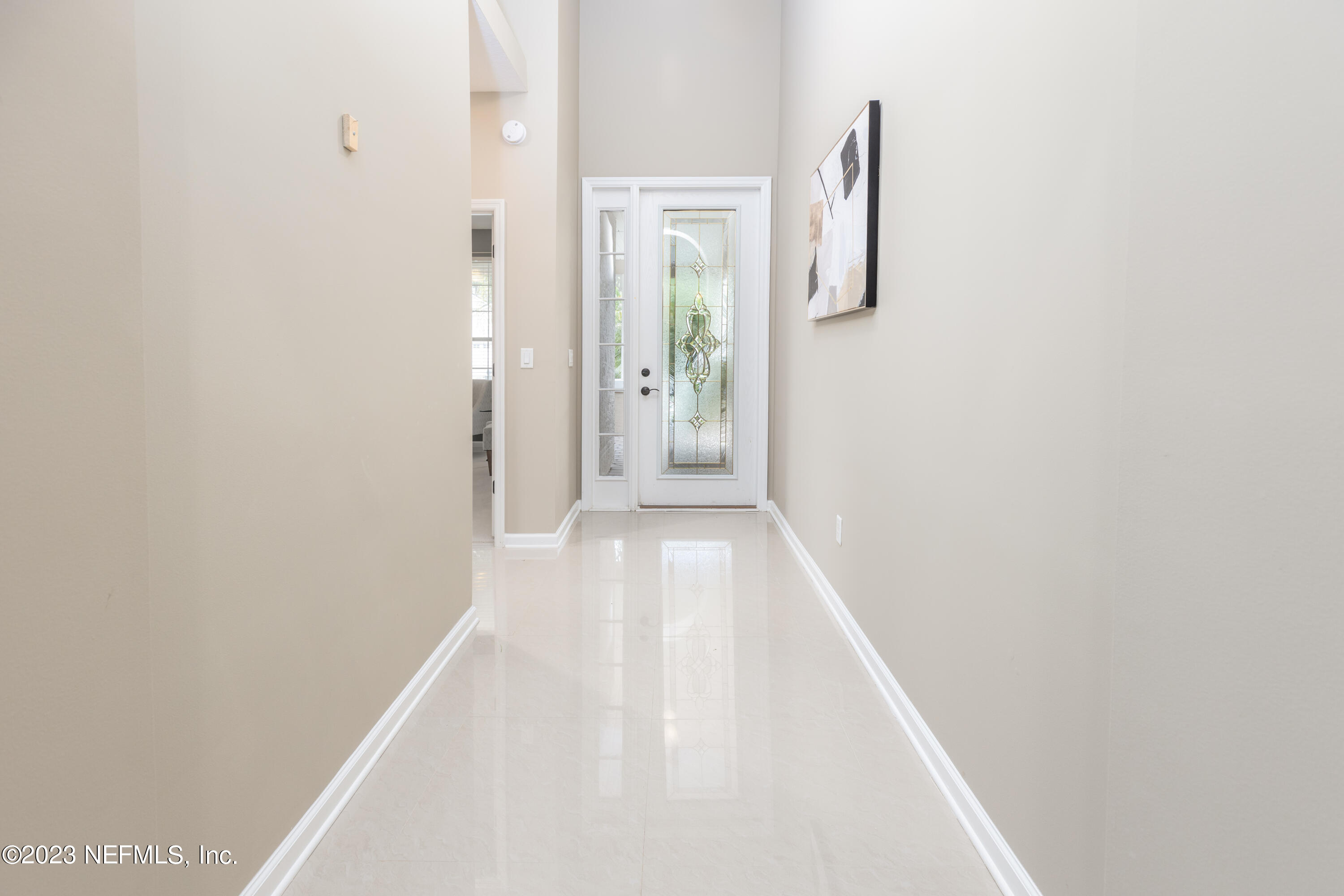 1516 Valhalla Way St. Augustine, FL 32092 - Photo 8 of 46 a view of a hallway with wooden floor