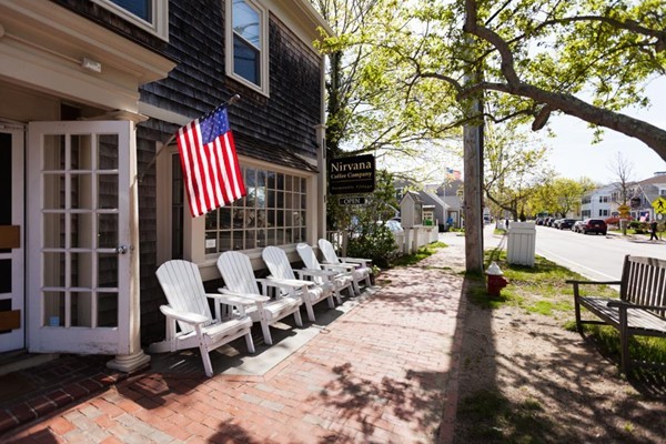 87 Salten Point Road Barnstable, MA 02630 - Photo 26 of 27 a view of a patio with table and chairs and potted plants