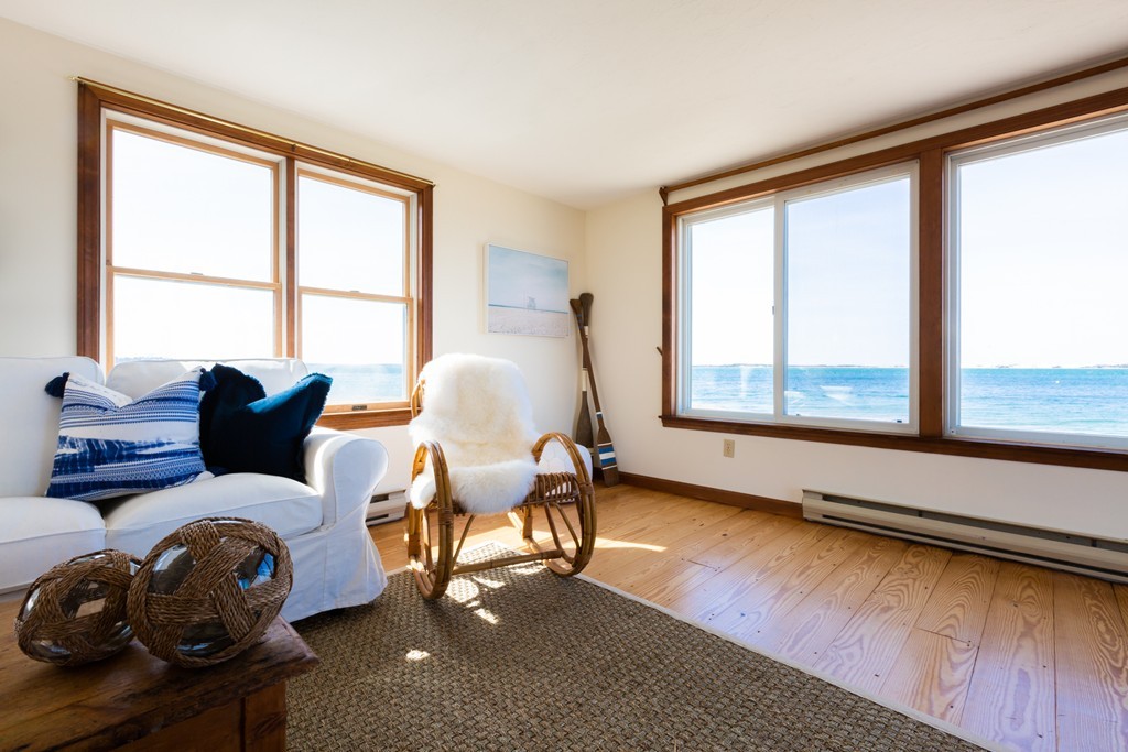 87 Salten Point Road Barnstable, MA 02630 - Photo 10 of 27 a living room with furniture and a large window