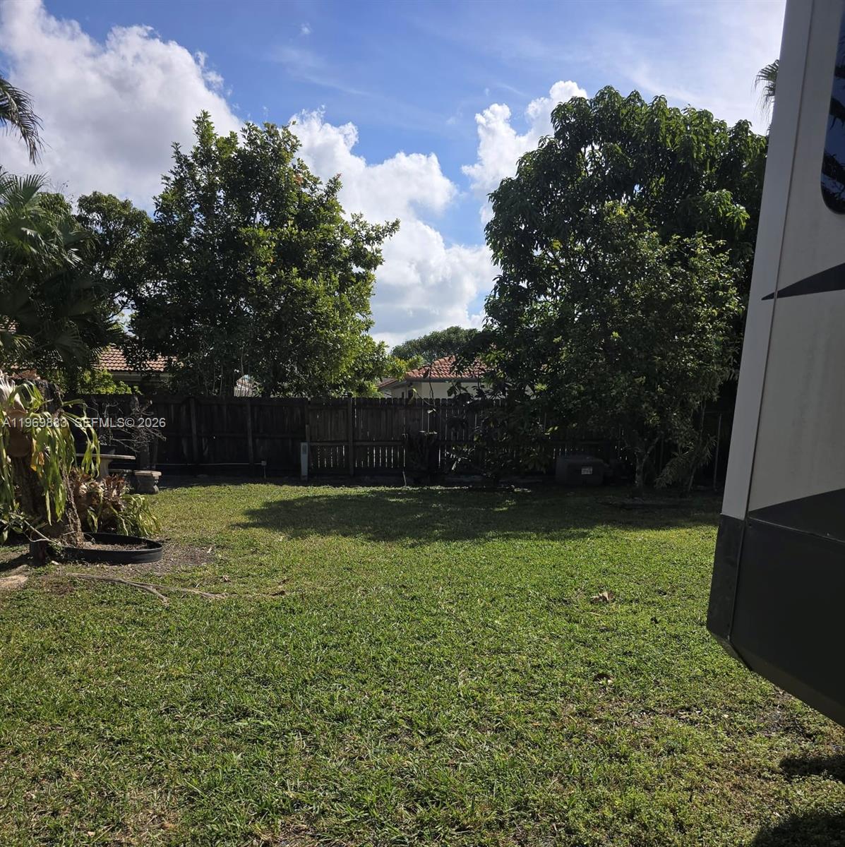 15641 Southwest 147th Avenue Miami, FL 33187 - Photo 20 of 20 a view of backyard with green space
