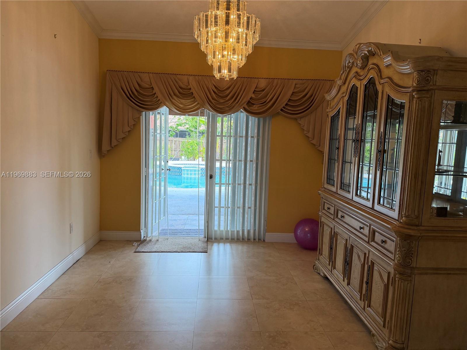 15641 Southwest 147th Avenue Miami, FL 33187 - Photo 5 of 20 a view of entryway