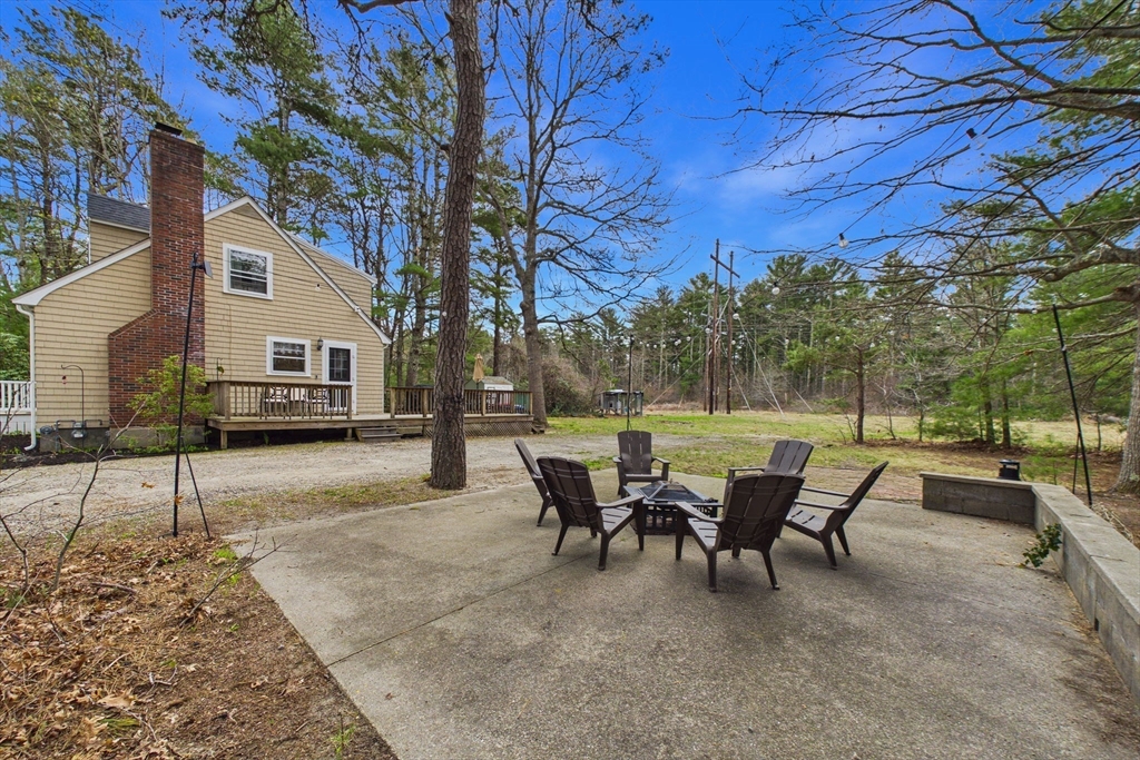 13 Albatross Avenue Wareham, MA 02538 - Photo 25 of 25 a view of a patio with a yard