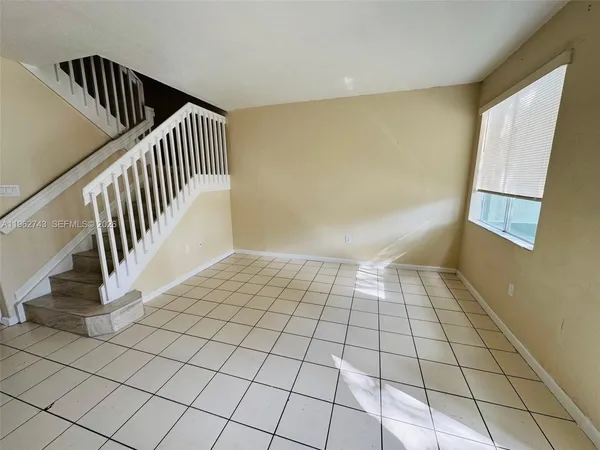 a view of an entryway with staircase