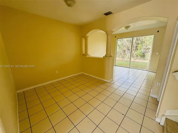 a view of a room with windows
