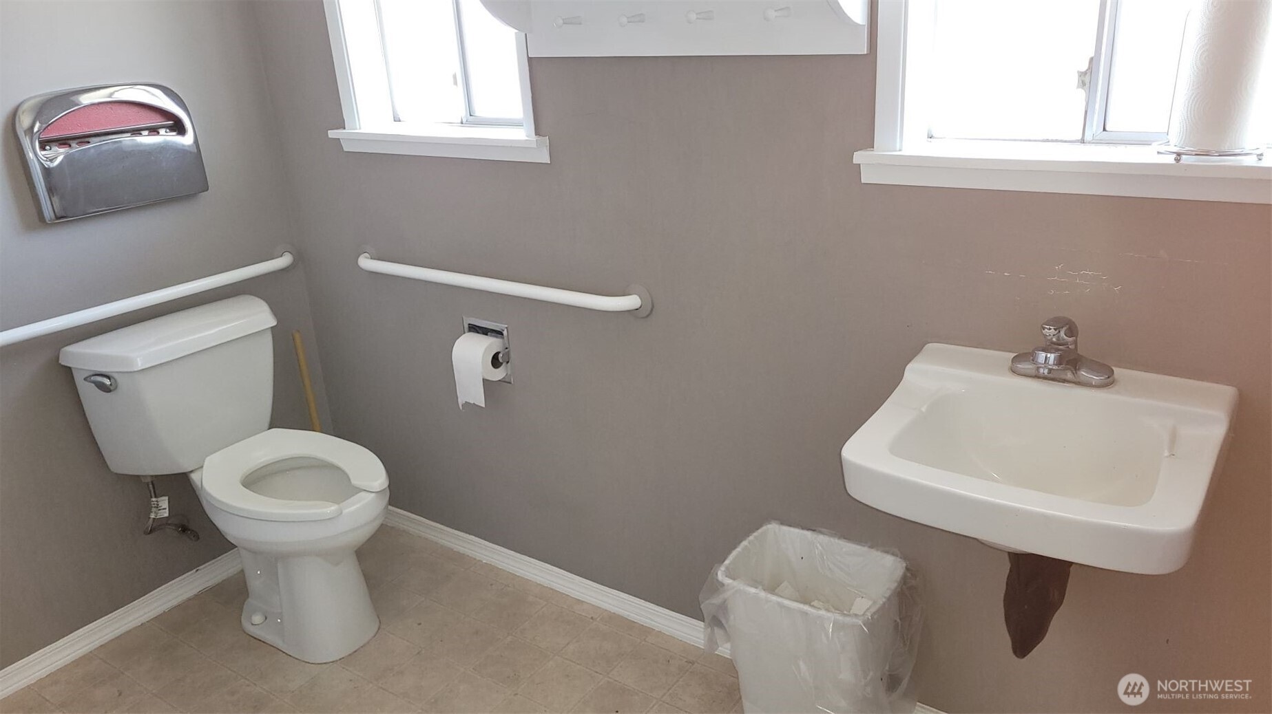 847 Blake Street Enumclaw, WA 98022 - Photo 5 of 5 a bathroom with a toilet sink and mirror