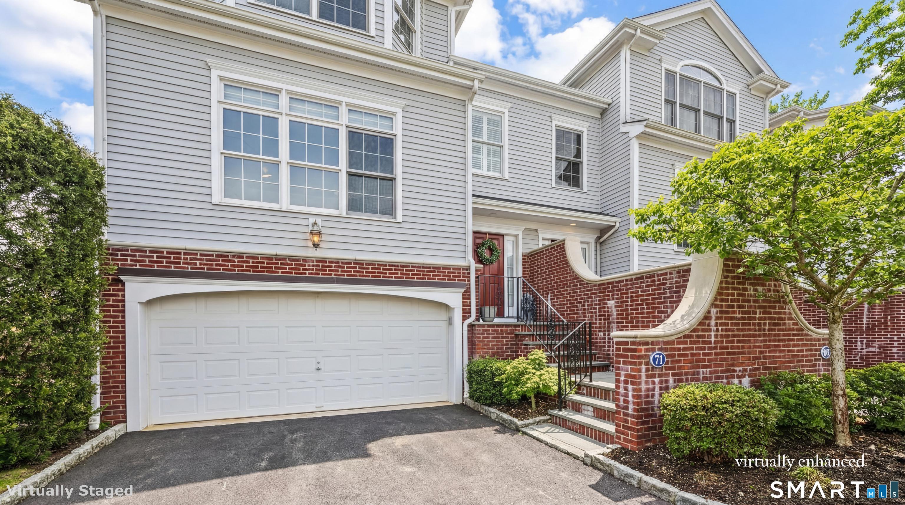 71 Aberdeen Way, Unit 71 Fairfield, CT 06890 - Photo 37 of 37 a front view of a house