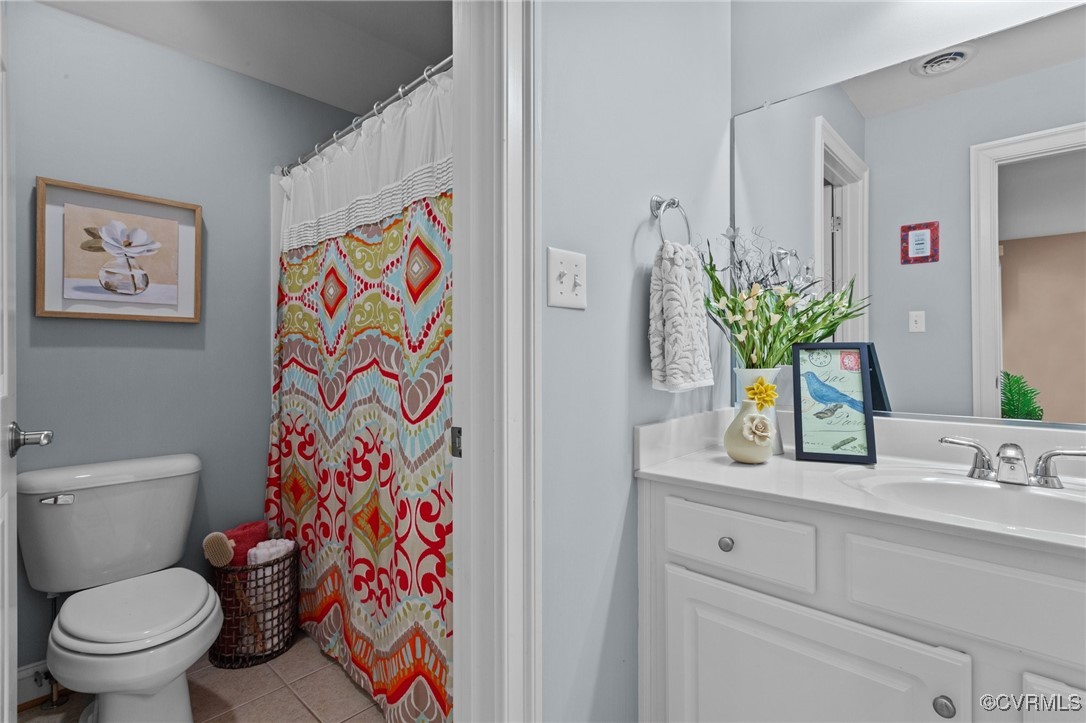 14337 Riverdowns S Drive Midlothian, VA 23113 - Photo 26 of 44 a bathroom with a toilet sink and mirror