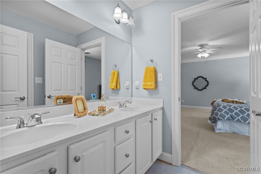 14337 Riverdowns S Drive Midlothian, VA 23113 - Photo 29 of 44 a bathroom with a double vanity sink and a mirror