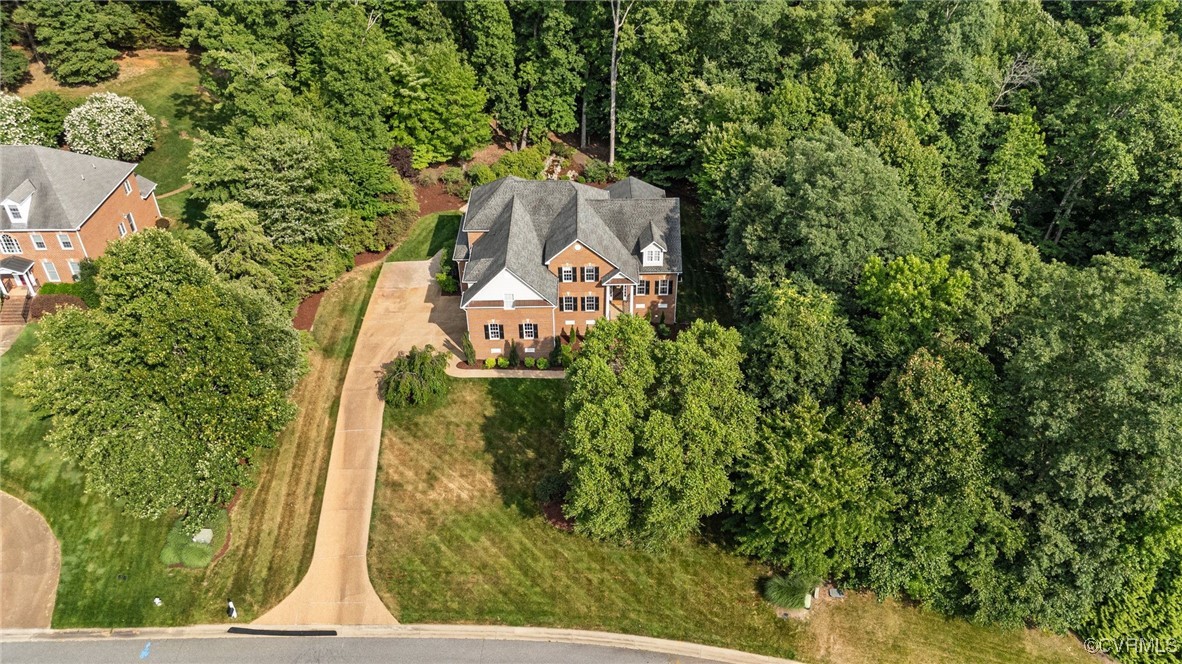 14337 Riverdowns S Drive Midlothian, VA 23113 - Photo 4 of 44 an aerial view of a house with a yard and large trees