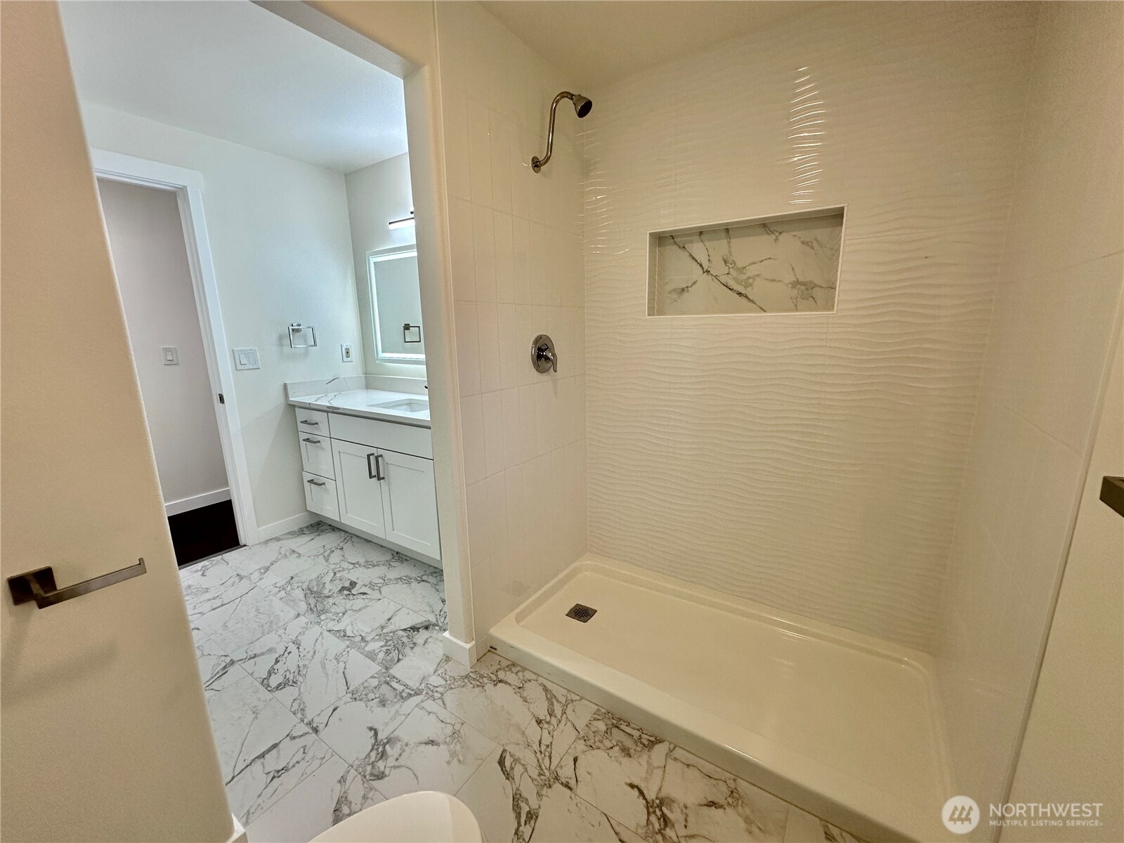 7044 Johnson Point Road Northeast Olympia, WA 98516 - Photo 11 of 36 a bathroom with a bathtub and shower