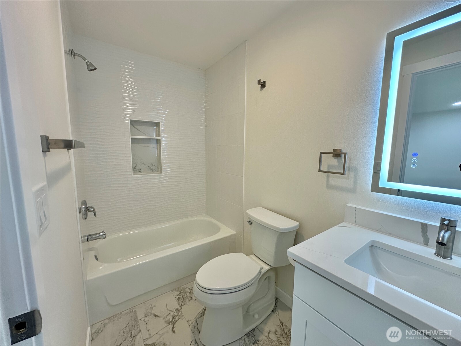 7044 Johnson Point Road Northeast Olympia, WA 98516 - Photo 19 of 36 a bathroom with a sink toilet vanity and shower