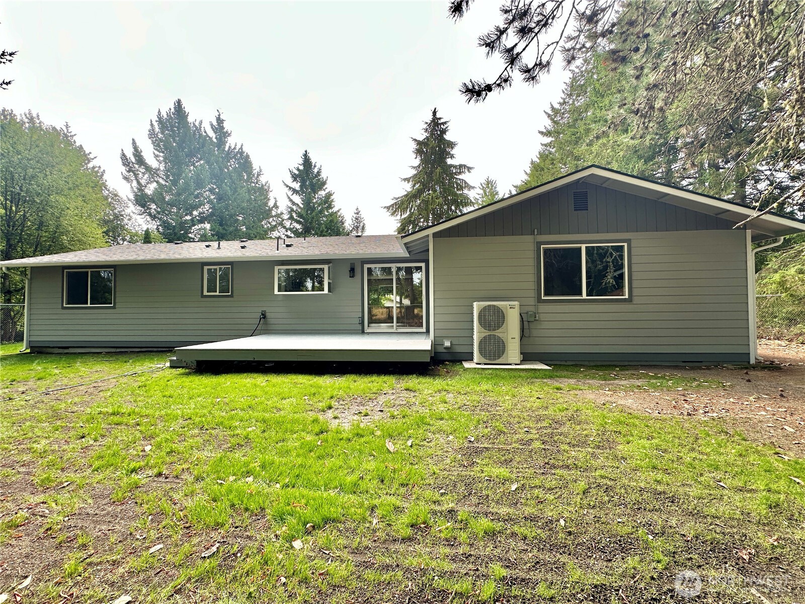 7044 Johnson Point Road Northeast Olympia, WA 98516 - Photo 29 of 36 a backyard of a house