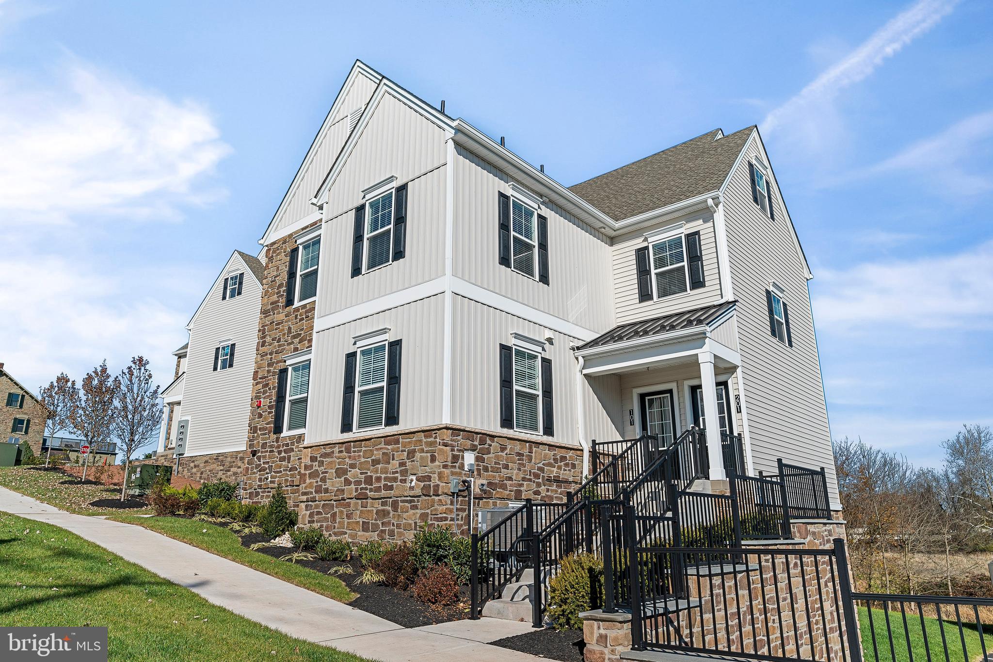a view of a white building among the street