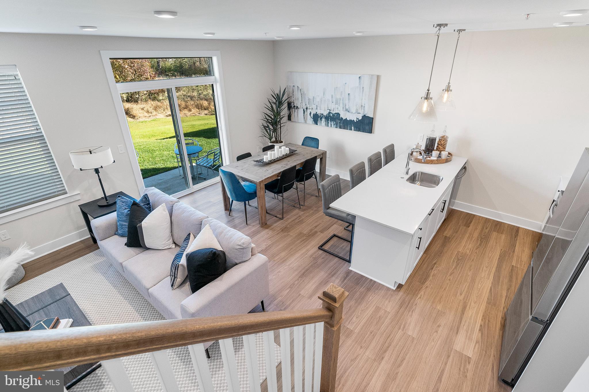 7 Mainland Road, Unit 102 Harleysville, PA 19438 - Photo 12 of 30 a living room with furniture and a window