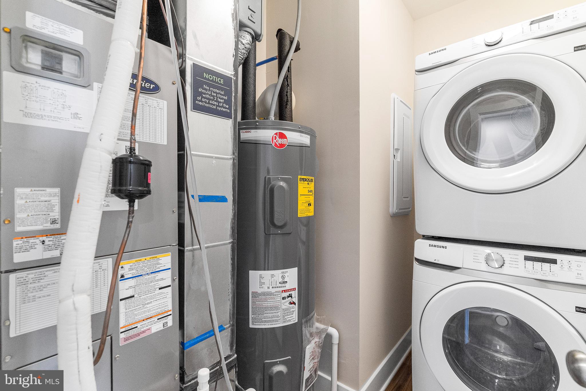 7 Mainland Road, Unit 102 Harleysville, PA 19438 - Photo 24 of 30 a utility room with dryer and washer