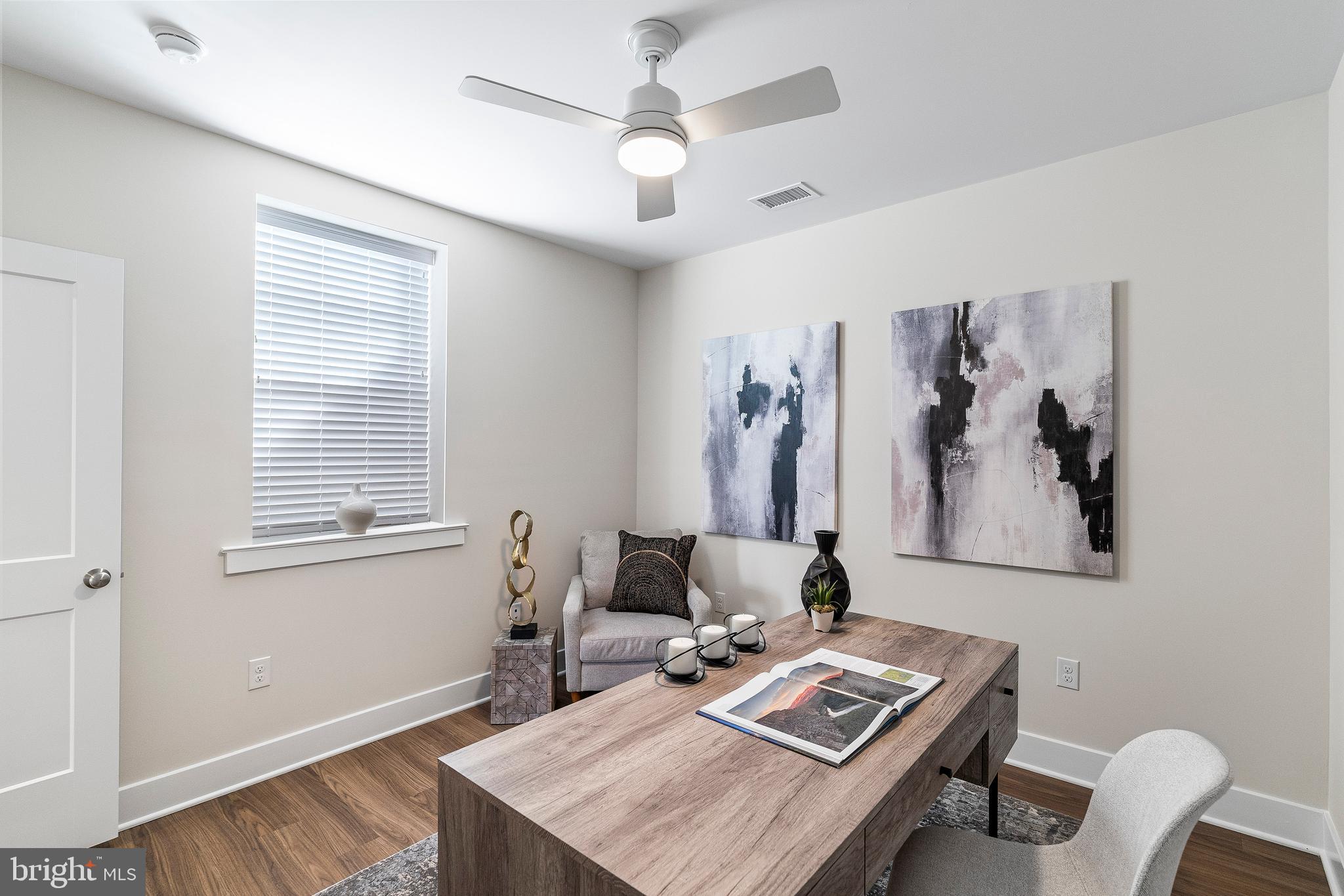 7 Mainland Road, Unit 102 Harleysville, PA 19438 - Photo 27 of 30 a workspace with furniture and window