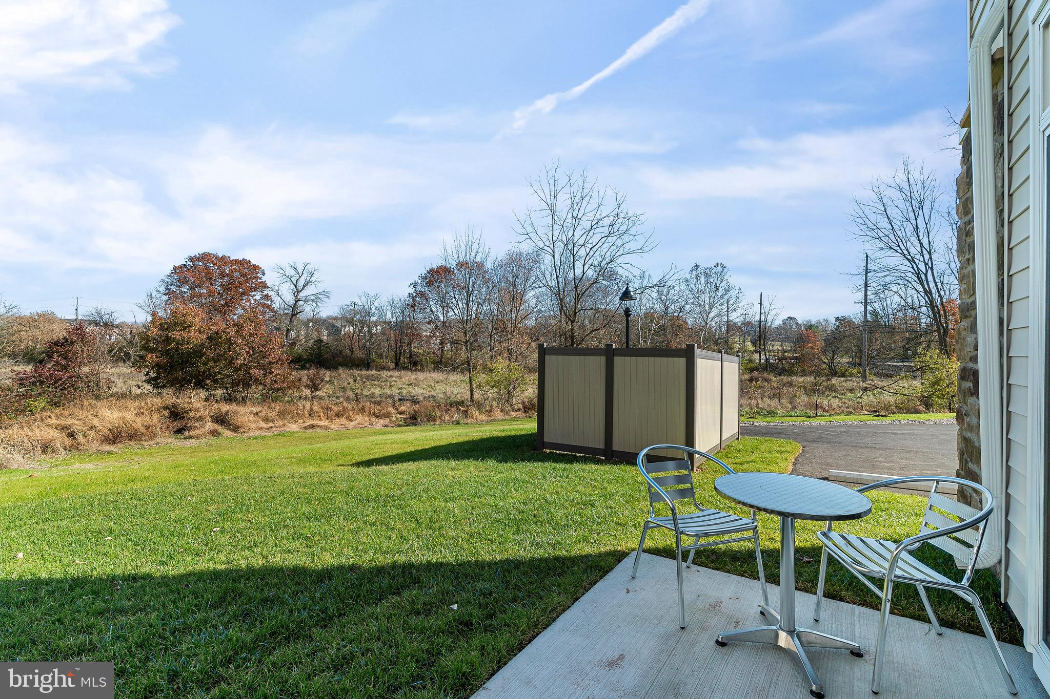 7 Mainland Road, Unit 102 Harleysville, PA 19438 - Photo 30 of 30 a view of a garden with furniture