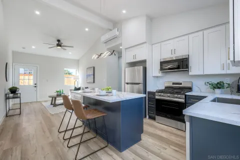 a view of a backyard with a garden and plants