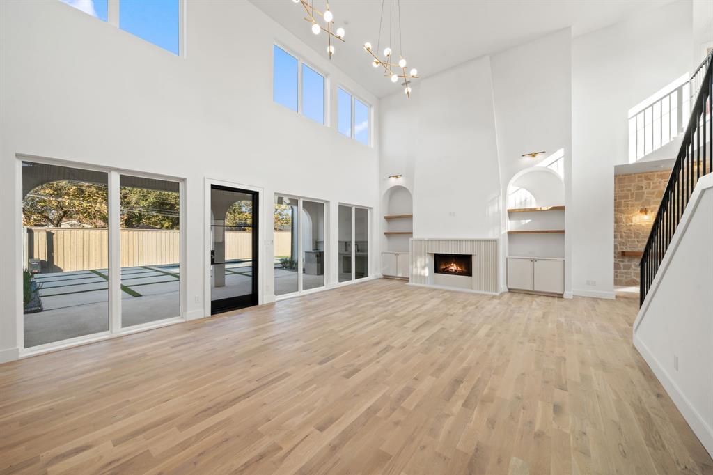 3341 Dothan Lane Dallas, TX 75229 - Photo 5 of 13 a view of a livingroom with a fireplace
