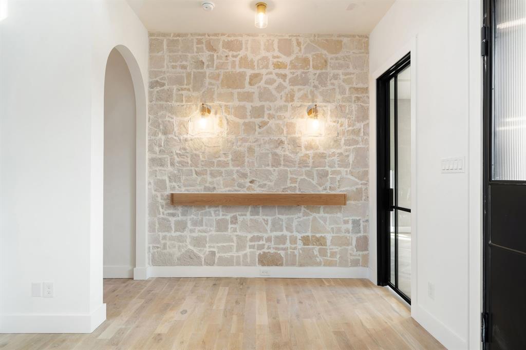 3341 Dothan Lane Dallas, TX 75229 - Photo 6 of 13 a view of wooden floor and brick walls