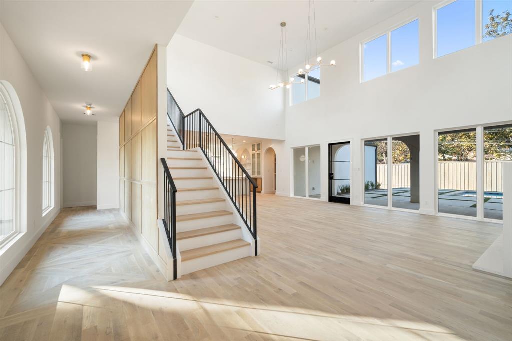 3341 Dothan Lane Dallas, TX 75229 - Photo 7 of 13 a view of entryway and hall with wooden floor