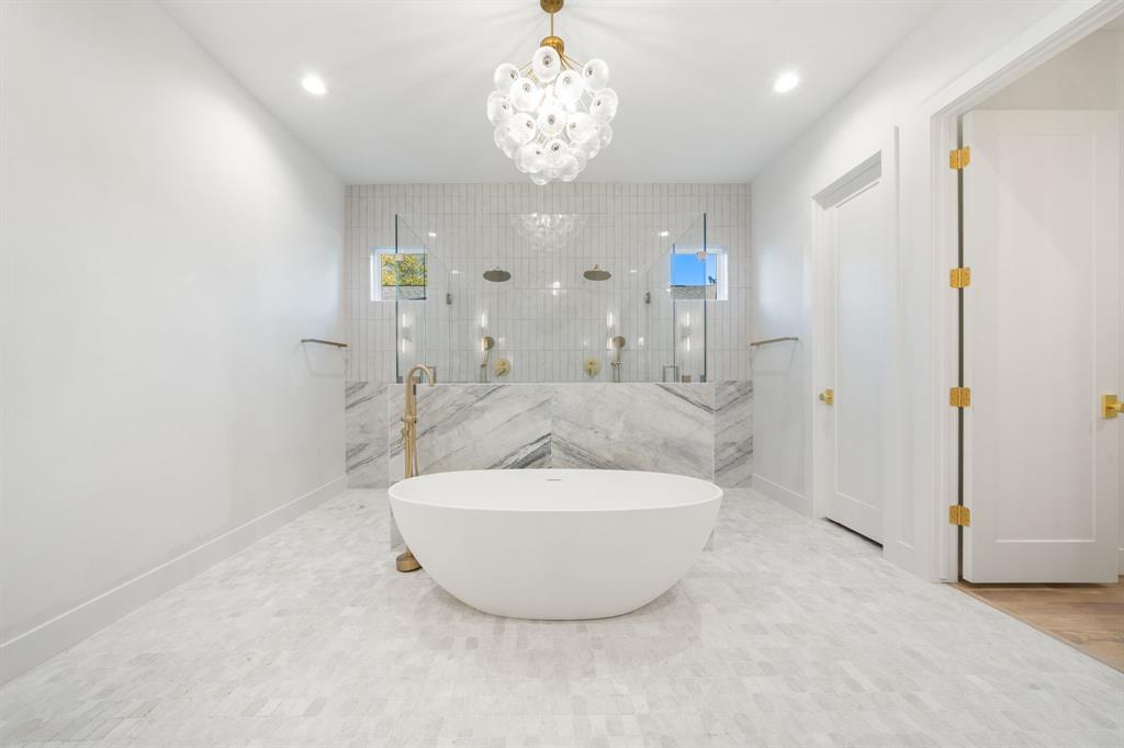 3341 Dothan Lane Dallas, TX 75229 - Photo 10 of 13 a bathroom with a sink and a mirror