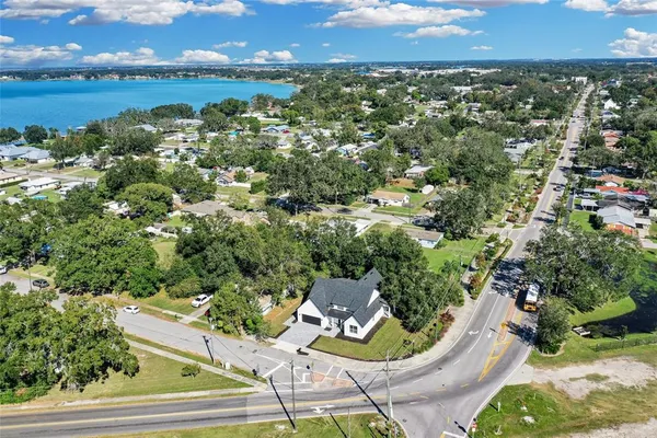 an aerial view of a house with outdoor space