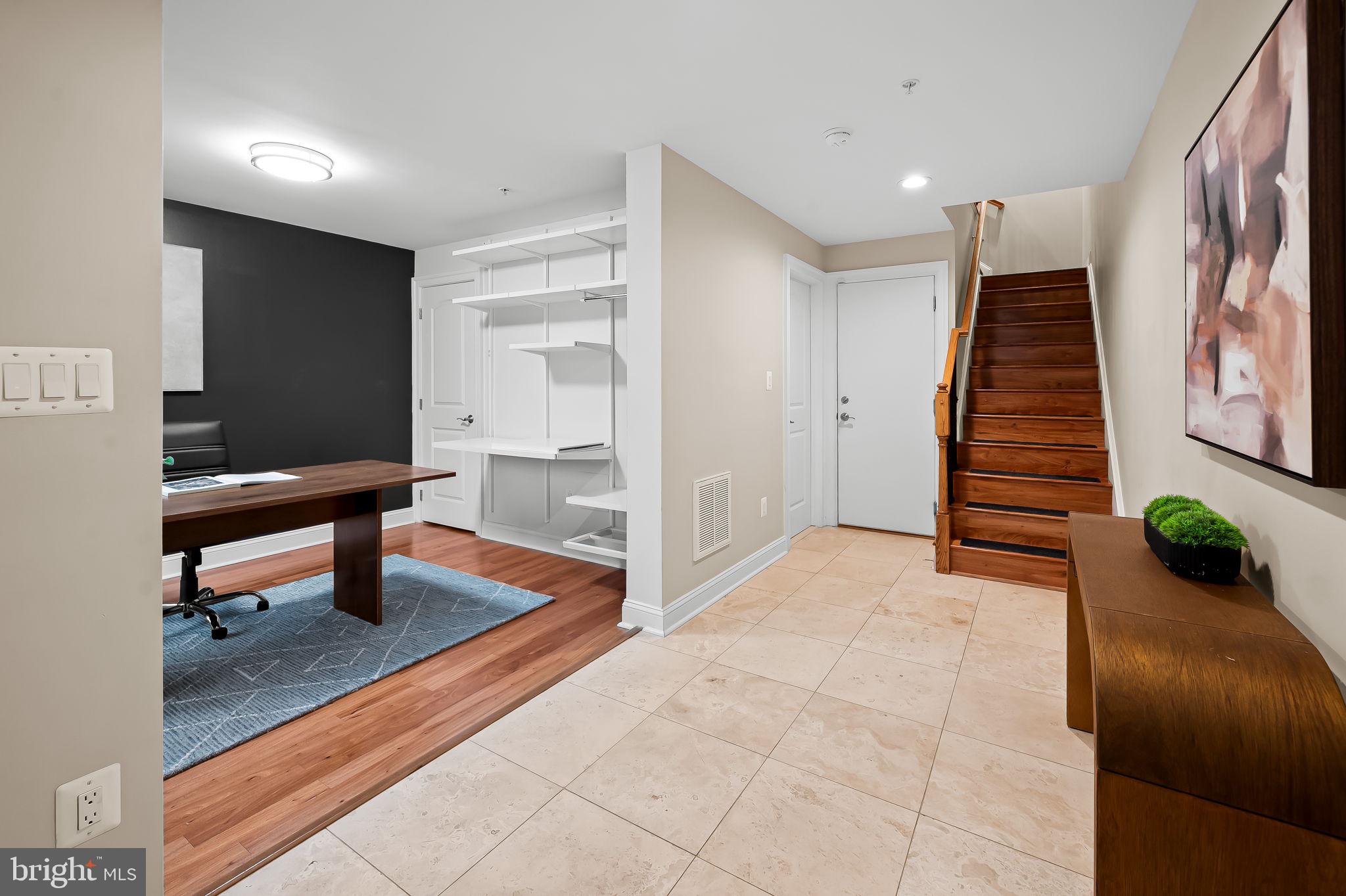 1024 Pier Pointe Landing, Unit 107 Baltimore, MD 21230 - Photo 9 of 51 a view of a hallway with seating area