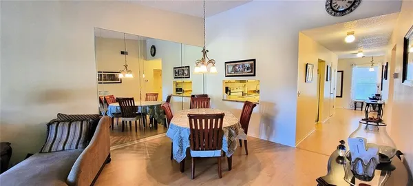 a view of a dining room with furniture