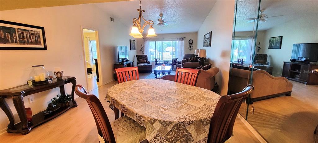 3505 Tarpon Woods Boulevard, Unit P408 Palm Harbor, FL 34685 - Photo 5 of 22 a view of a dining room with furniture