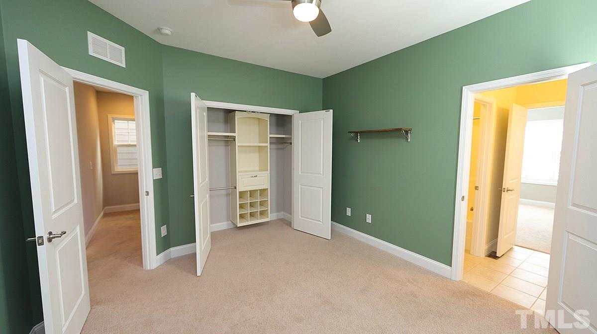 1541 Fullerton Place Raleigh, NC 27607 - Photo 19 of 29 an empty room with closet and a bathroom