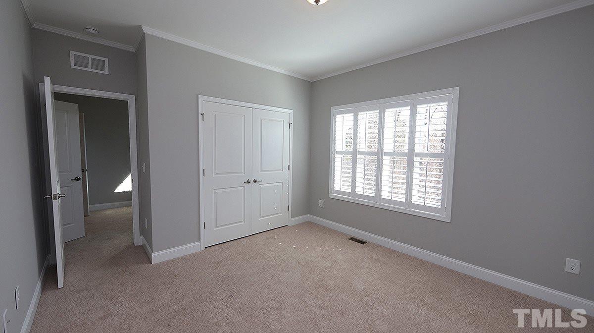 1541 Fullerton Place Raleigh, NC 27607 - Photo 20 of 29 an empty room with windows