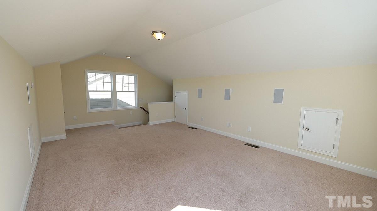 1541 Fullerton Place Raleigh, NC 27607 - Photo 22 of 29 an empty room with windows and closet