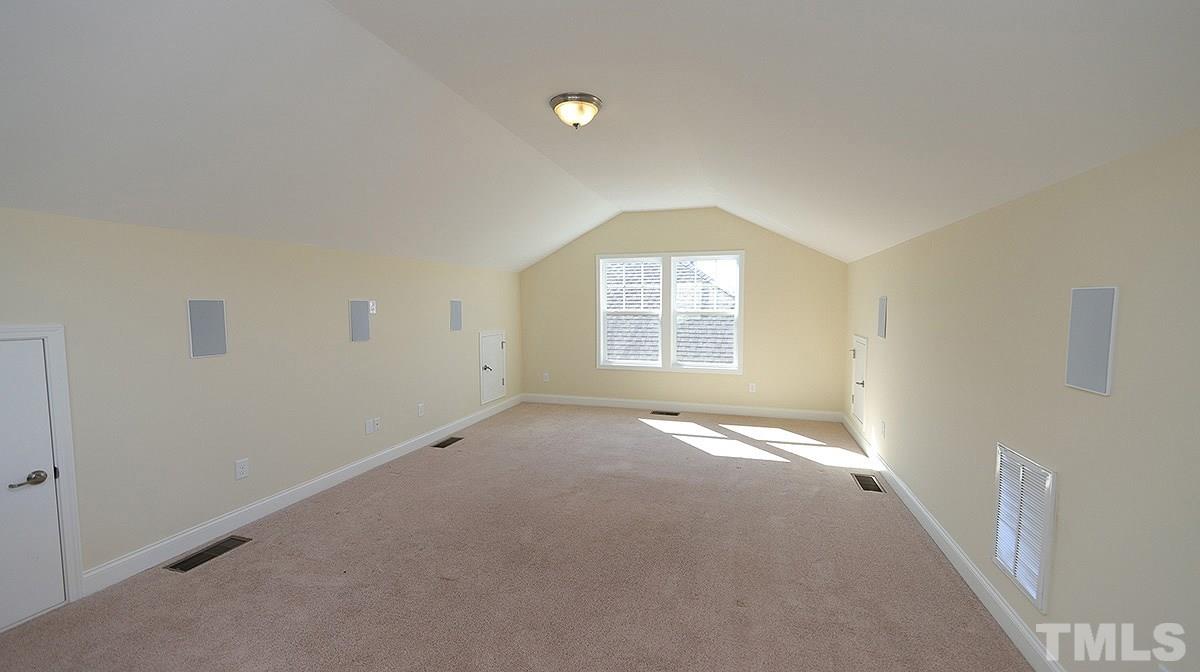 1541 Fullerton Place Raleigh, NC 27607 - Photo 23 of 29 an empty room with a empty space and windows