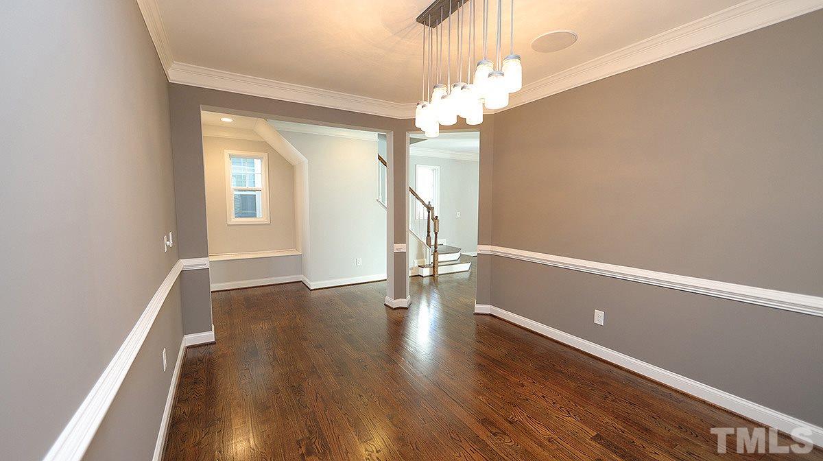 1541 Fullerton Place Raleigh, NC 27607 - Photo 5 of 29 a view of livingroom with window and wooden floor