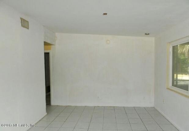 7022 Rollo Road Jacksonville, FL 32205 - Photo 2 of 10 a view of an empty room